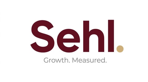 Sehl logo with tagline Growth. Measured. in burgundy and tan colors